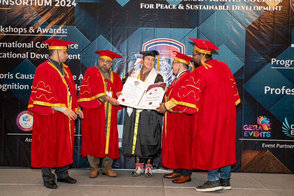 Horticulture Association of Bhutan President receiving honorary doctorate certificate at official ceremony
