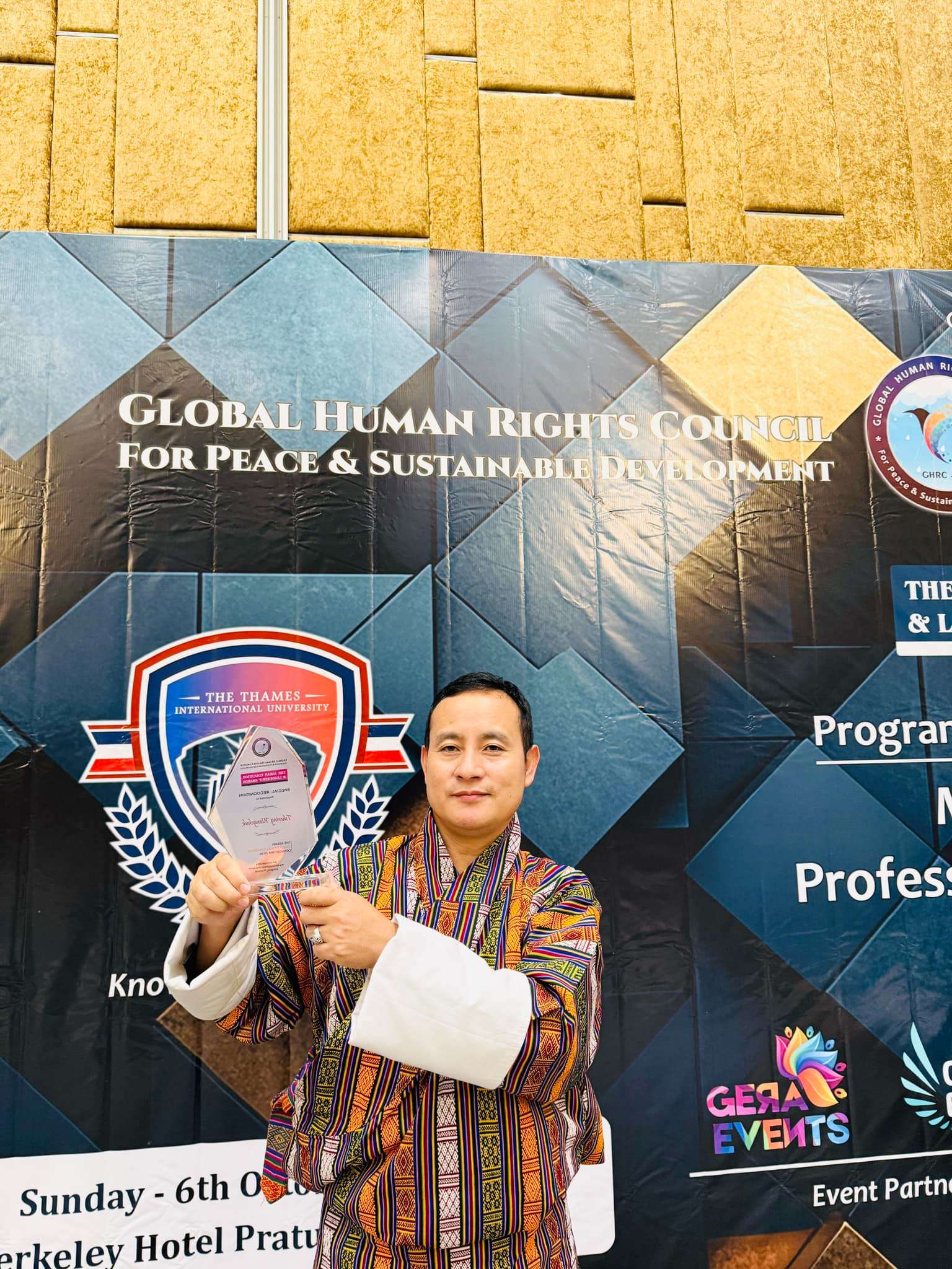 Dr. Tshering Wangchuk receiving the Global Human Rights Council award for Peace & Sustainable Development