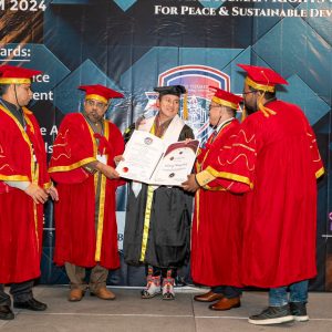 Horticulture Association of Bhutan President receiving honorary doctorate certificate at official ceremony